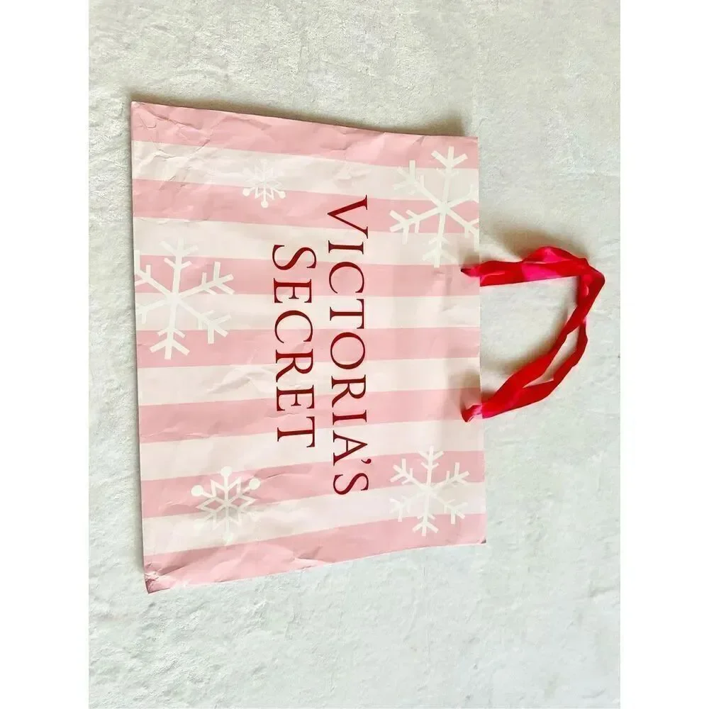 Victoria’s Secret large holiday light pink and red gift bag tote with snowflakes